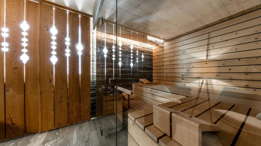 Kueng sauna wellness indoor kokon valserquarzit arvenholz 15