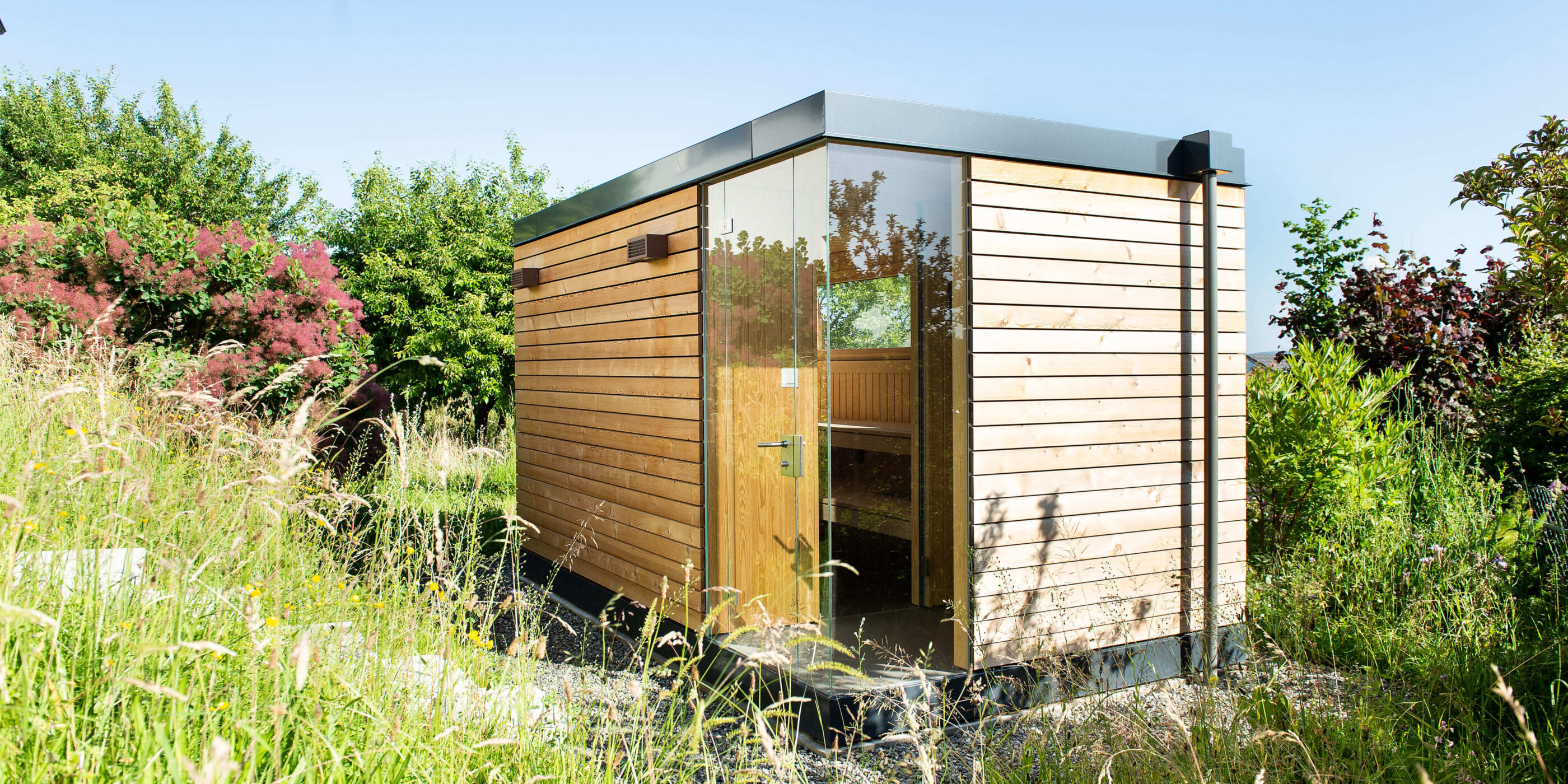 Kueng sauna wellness nido outdoor garten holz glaswand 1